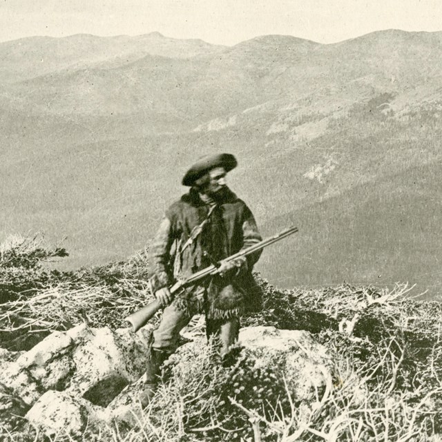 Harry Yount surveying landscape, 1874
