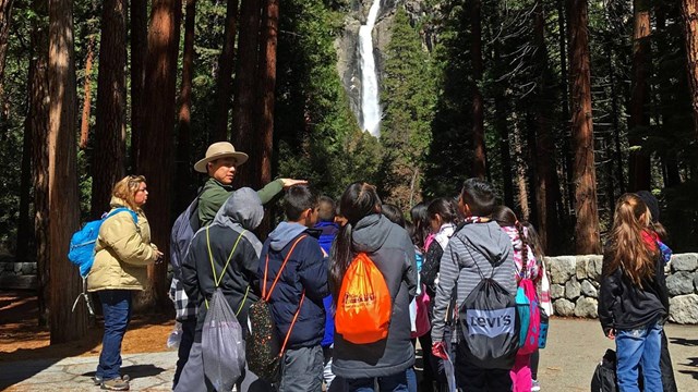 Ranger leading group of students to Lower Yosemite Fall