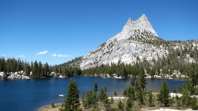 Cathedral Peak rises beyond one of the Cathedral Lakes