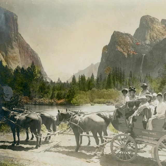 Color tinted historic image of horse drawn stage in Yosemite Valley