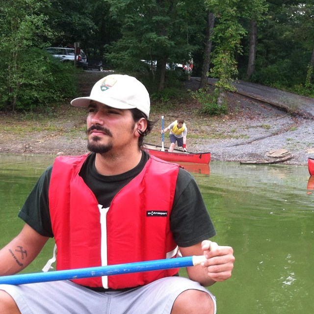 Scientist in a canoe
