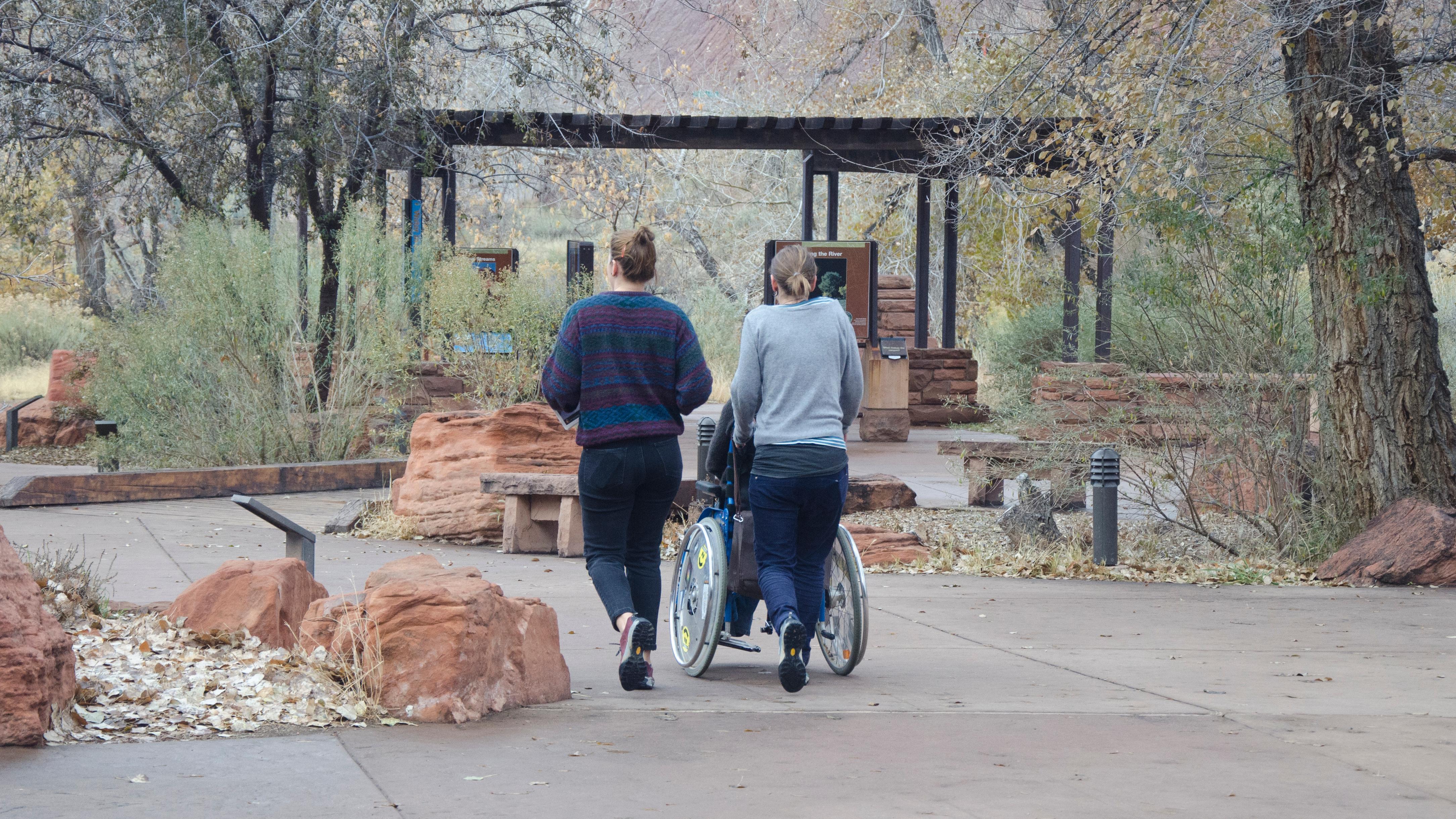 Person using wheelchair near Zion Canyon Visitor Center.
