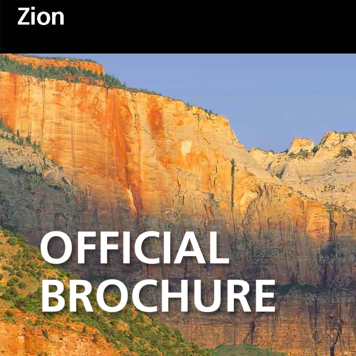 A blue sky over sandstone mountains with text reading 