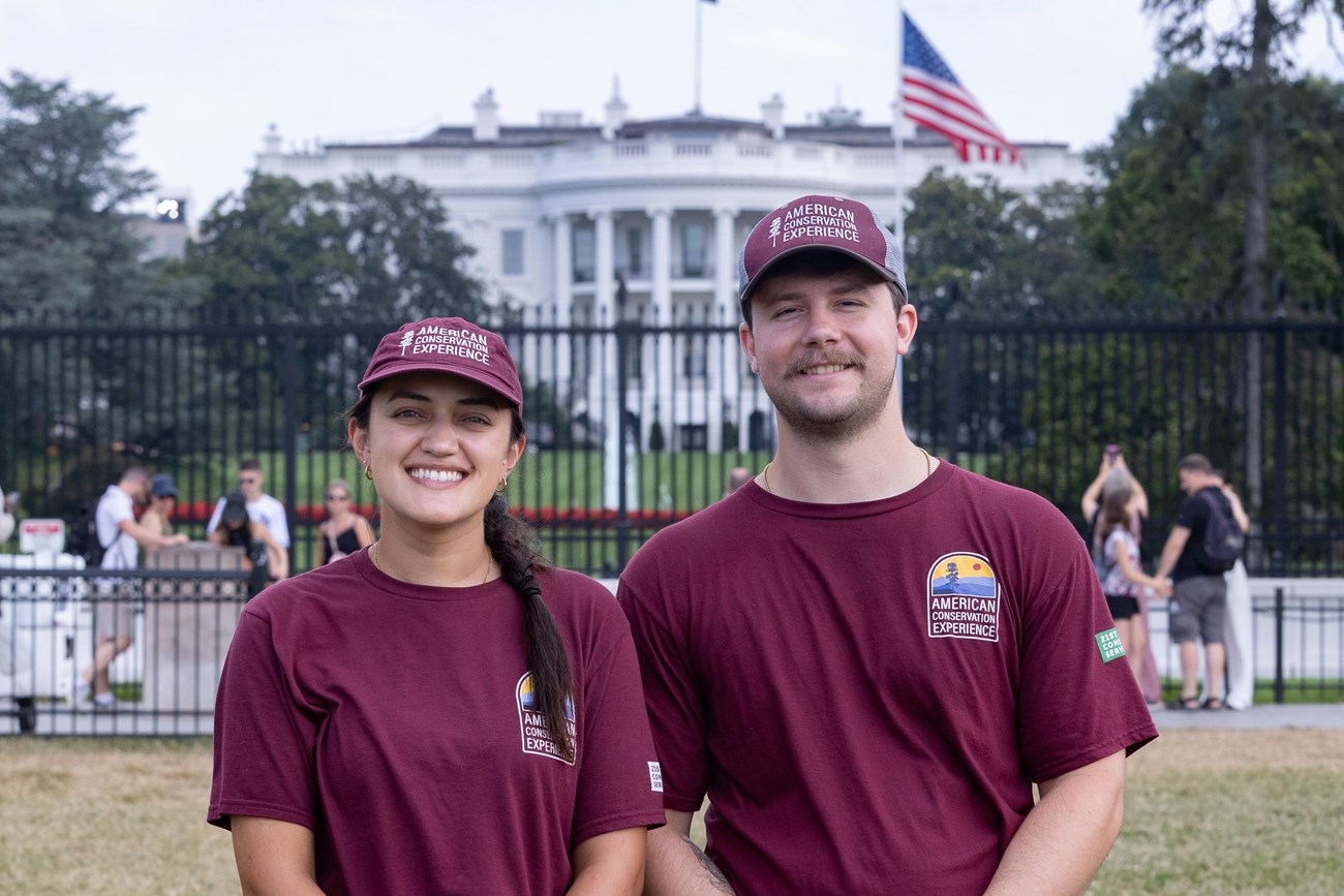 Traditional Trades Advancement Program (TTAP) interns Kendall Soriano (right) and Brenton Tate (left) smile near the White House in Washington, July 22, 2025. NPS / Kelsey Graczyk