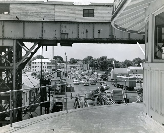 Three lines of bumper to bumper cars lined up.