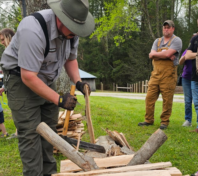 park staff demonstration log splitting
