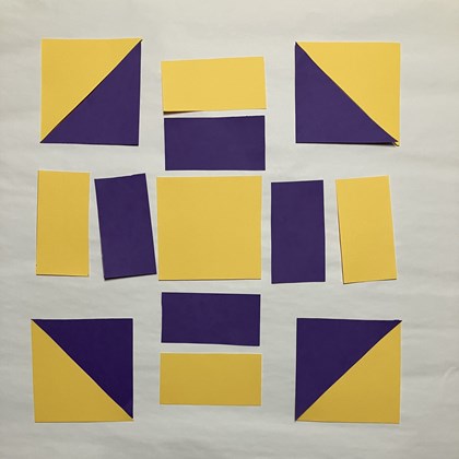 A yellow and purple designed block spread into sections.
