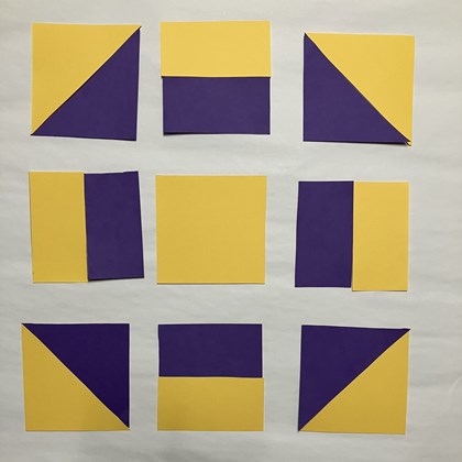 A yellow and purple designed block spread into sections.