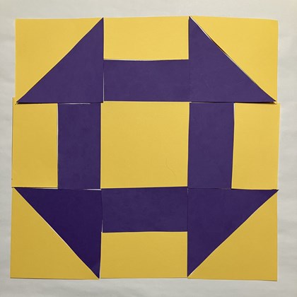 A yellow and purple designed block.