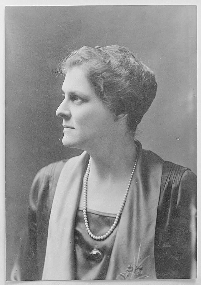 A woman's portrait in black and white.