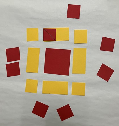 Multiple yellow and red squares laid out.
