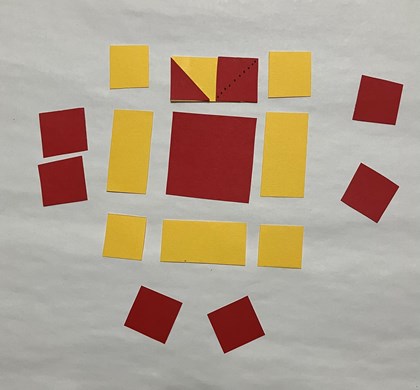Multiple yellow and red squares laid out. One overlapped with other at top.