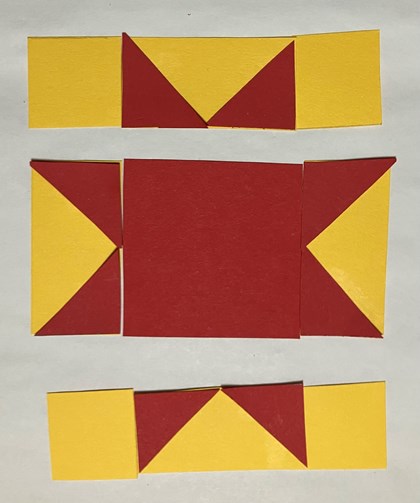 Three rows of red and yellow paper, each has red triangle points.