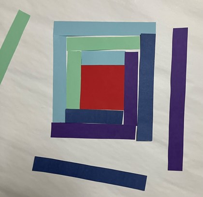 Strips of paper of different colors and sizes around a square.