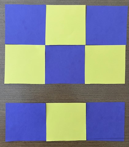 A 3x3 set of yellow and blue block cut-outs, one row apart