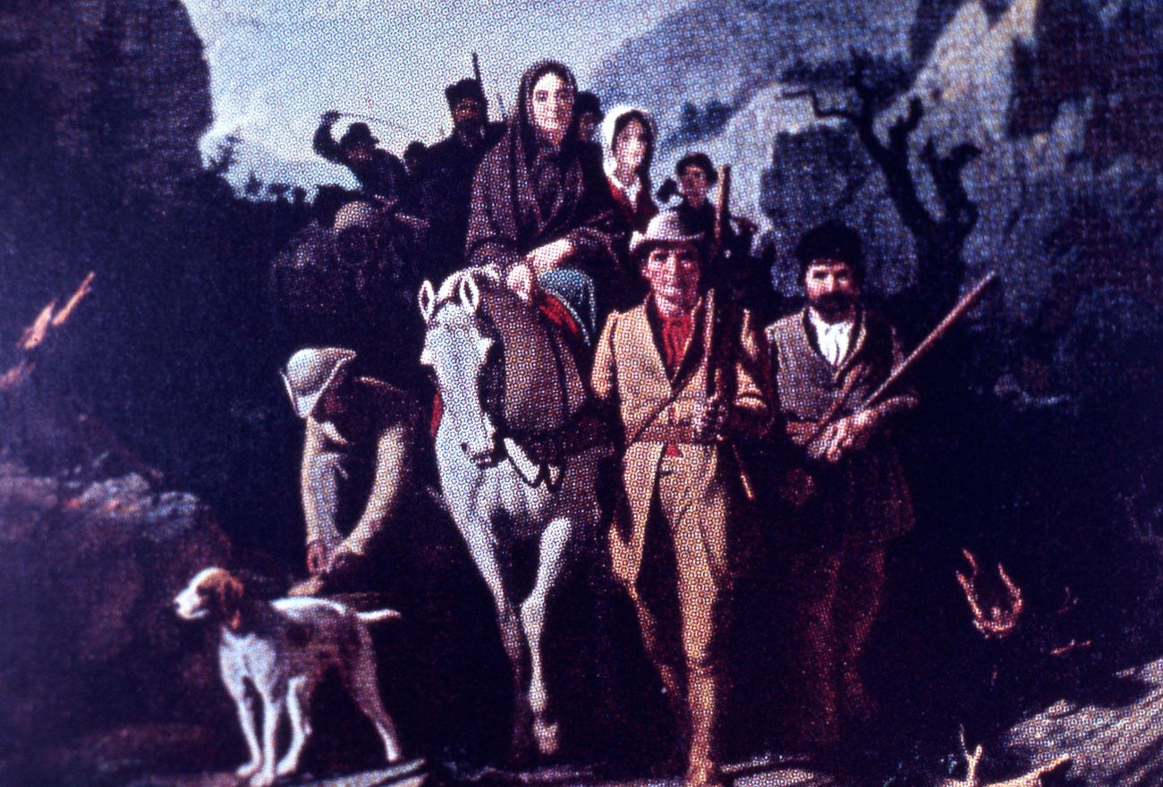 A group of people, horses, and a hound dog walking in a line.