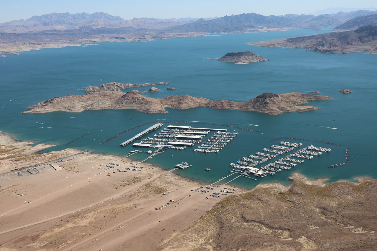 Aerial view of two large docks on a desert lake