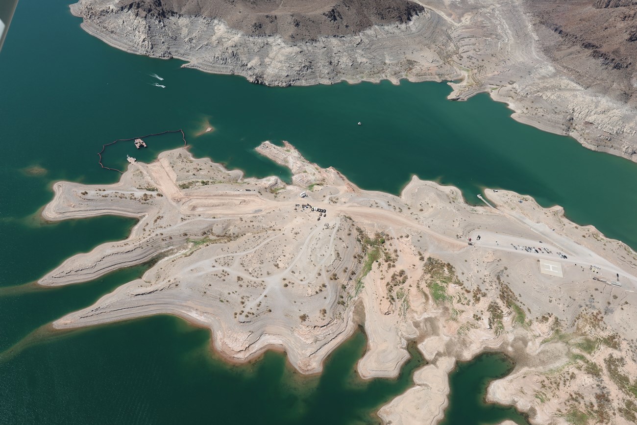 Aerial view of desert lake in sandstone canyons