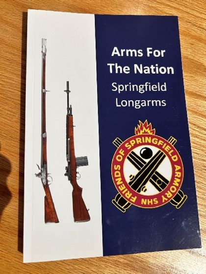 Book cover with two rifles shown vertically.  Title is 