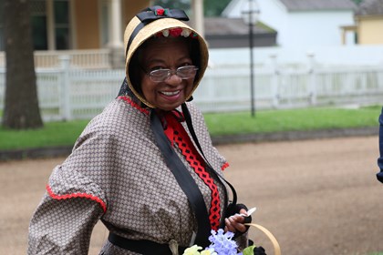 Elizabeth Jenkins outside the Jenkins lot smiling.