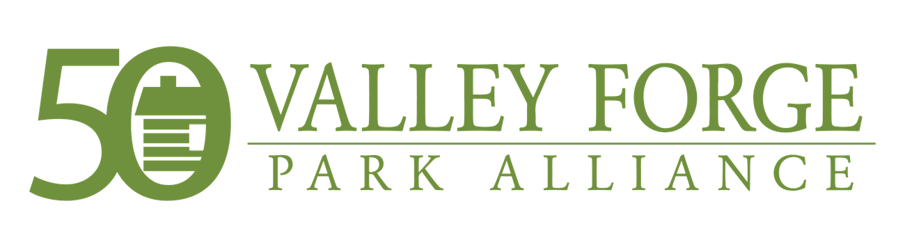 log hut inside the zero of number 50 Valley Forge Park Alliance