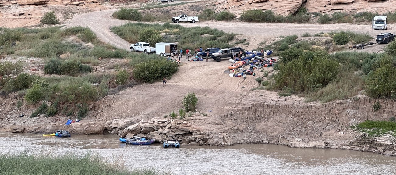 View across a river to a primitive boat ramp