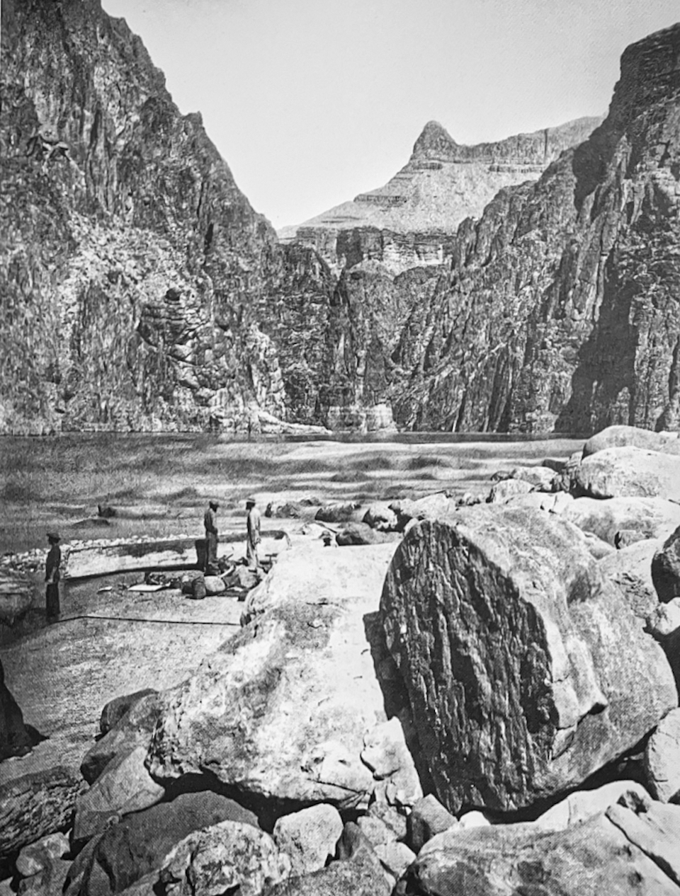 River canyon with boats and men