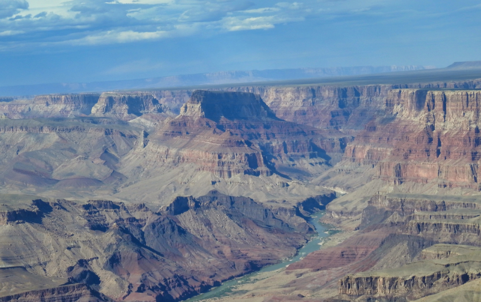 A man and woman with canyon in background