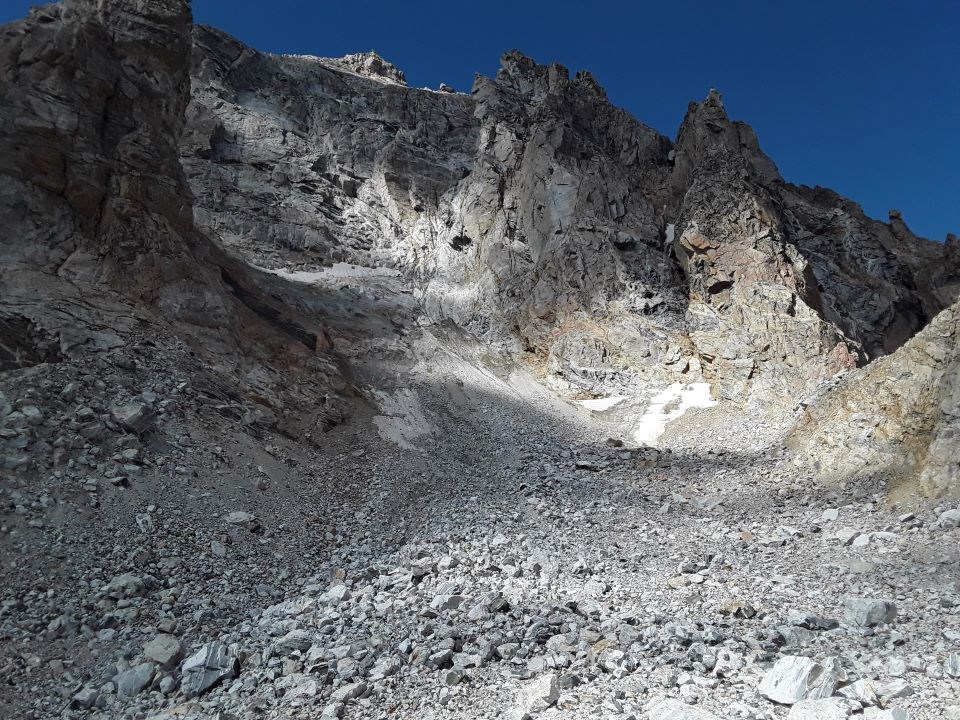 snow field over rocks