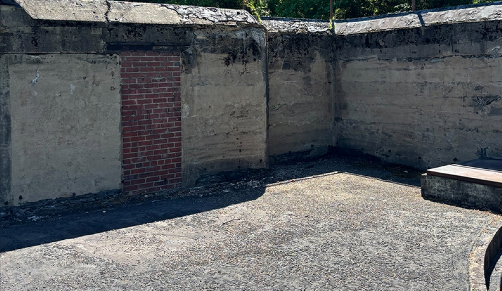 A concrete battery covered in graffiti