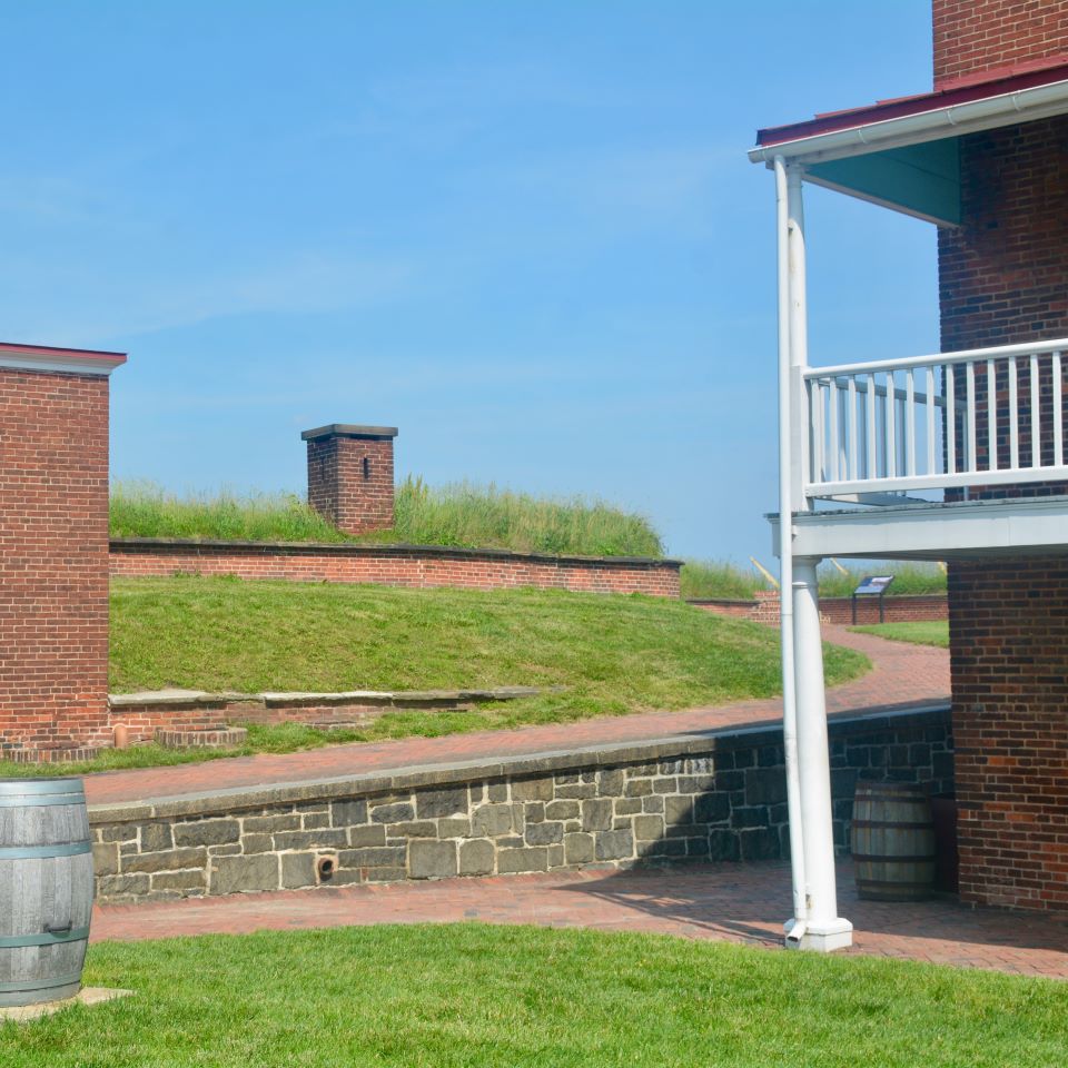 During a celebration, temporary stands elevate attending officers and other important individuals.