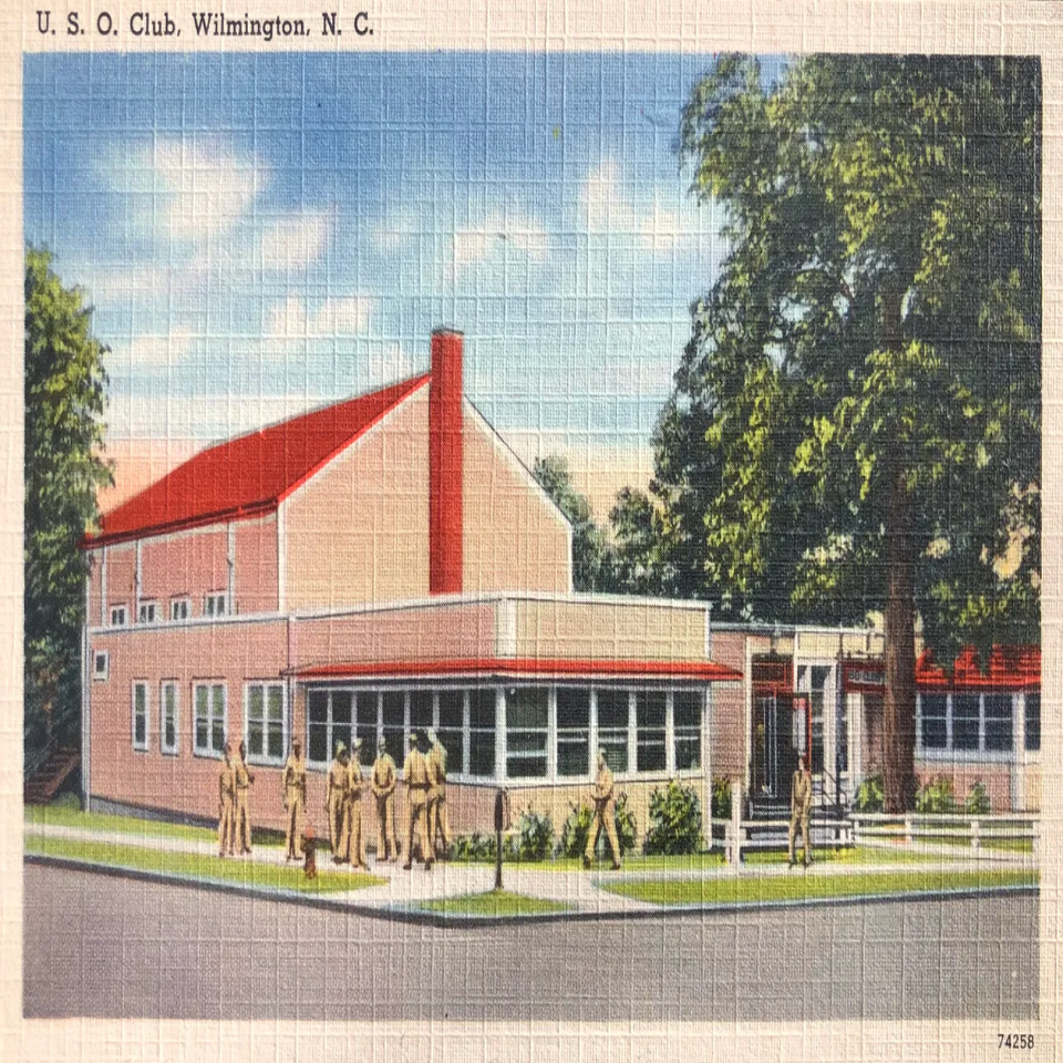 A linen postcard from the 1940s depicts military men arriving at the USO Club at Second and Orange streets, which is now known as Hannah Block Historic USO/Community Arts Center.