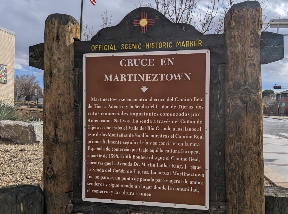 Historic Marker in English, brown sign with white text.