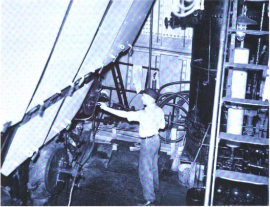 crew member inspects the boiler of Hercules