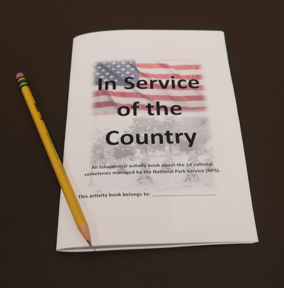 Activity booklet with yellow pencil