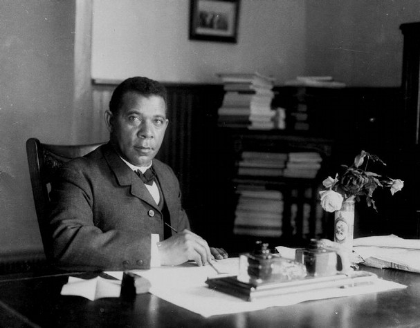 Booker T. Washington at his desk in the Tuskegee Institute.