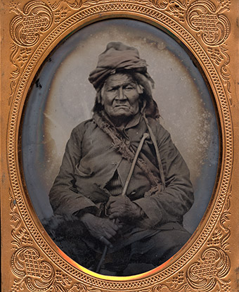 Photograph of Chief Okemos with traditional turban and pipe