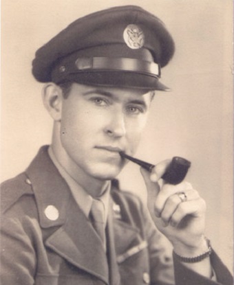 black and white portrait of a man in uniform with a pipe