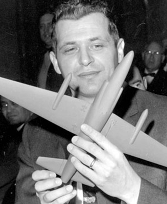 Gary Powers holds a model of a U-2 spyplane after his release from captivity