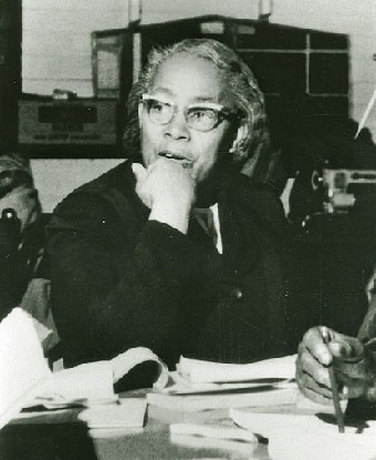 Septima Clark at a desk with papers on it.