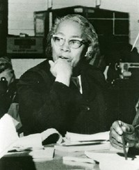 Septima Clark at a desk with papers on it.