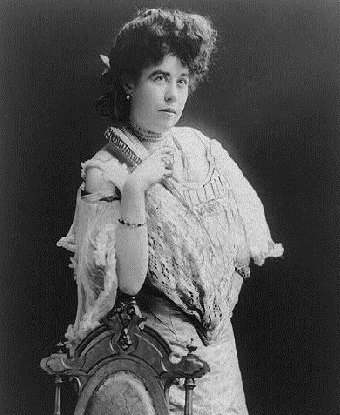 Black and white photo of Molly Brown leaning against a chair. Library of Congress. Black and white photo of Molly Brown leaning against a chair. Library of Congress.
