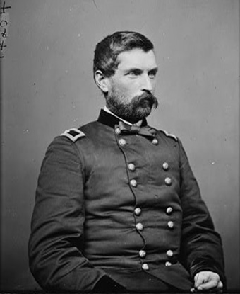 Black and white photographic portrait of a man wearing a Civil War-era military uniform