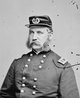 Studio portrait of Gen. John G. Foster seated
