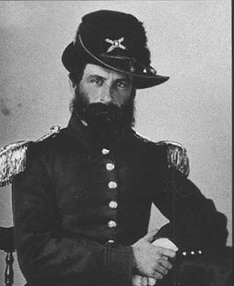 George S. James seated for a studio portrait in his US Army artillery uniform
