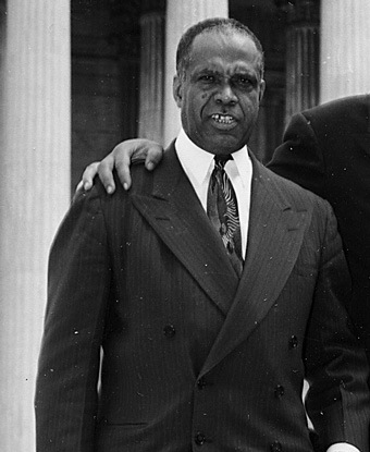 George Hayes stands on the steps of the U.S. Supreme Court