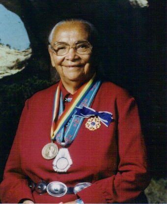 Woman smiling with medals