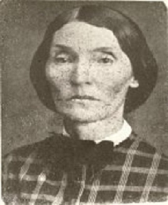 black and white photo of a woman looking stern