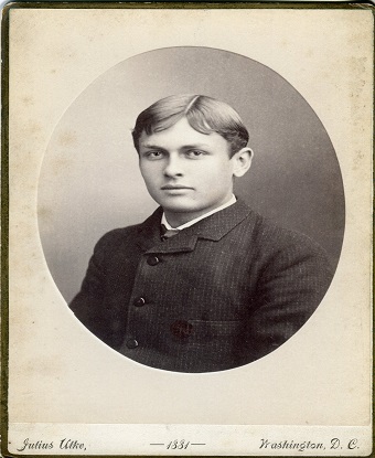 a black and white photo showing a young man