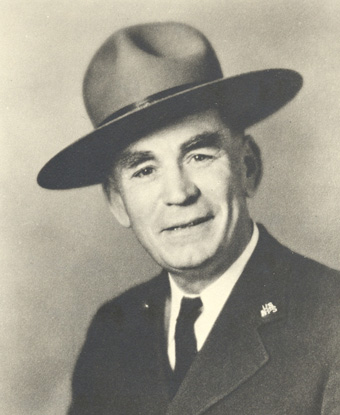 sepia-toned portrait of man with tie and ranger&#39;s flat hat